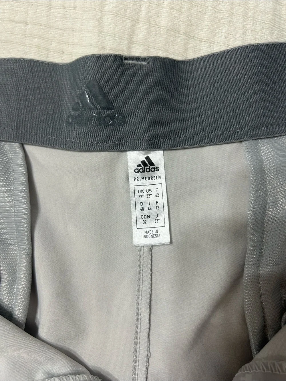 adidas flat front